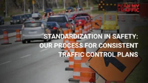 Work zone with traffic cones and lane shift sign demonstrating standardized and consistent traffic control plans process