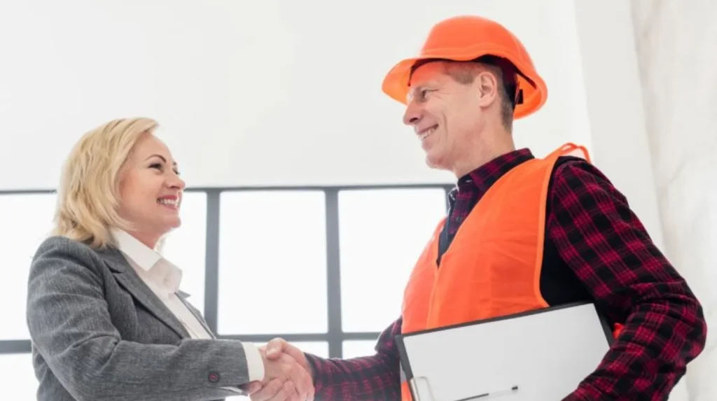 Client shaking hands with traffic engineer after approving project quote