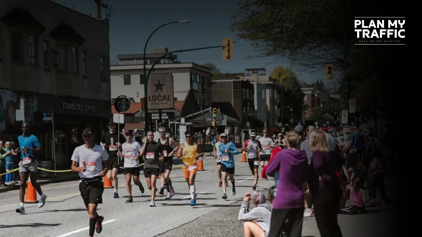Runners in city marathon with cones showing up with Event Traffic Management Plan Vancouver