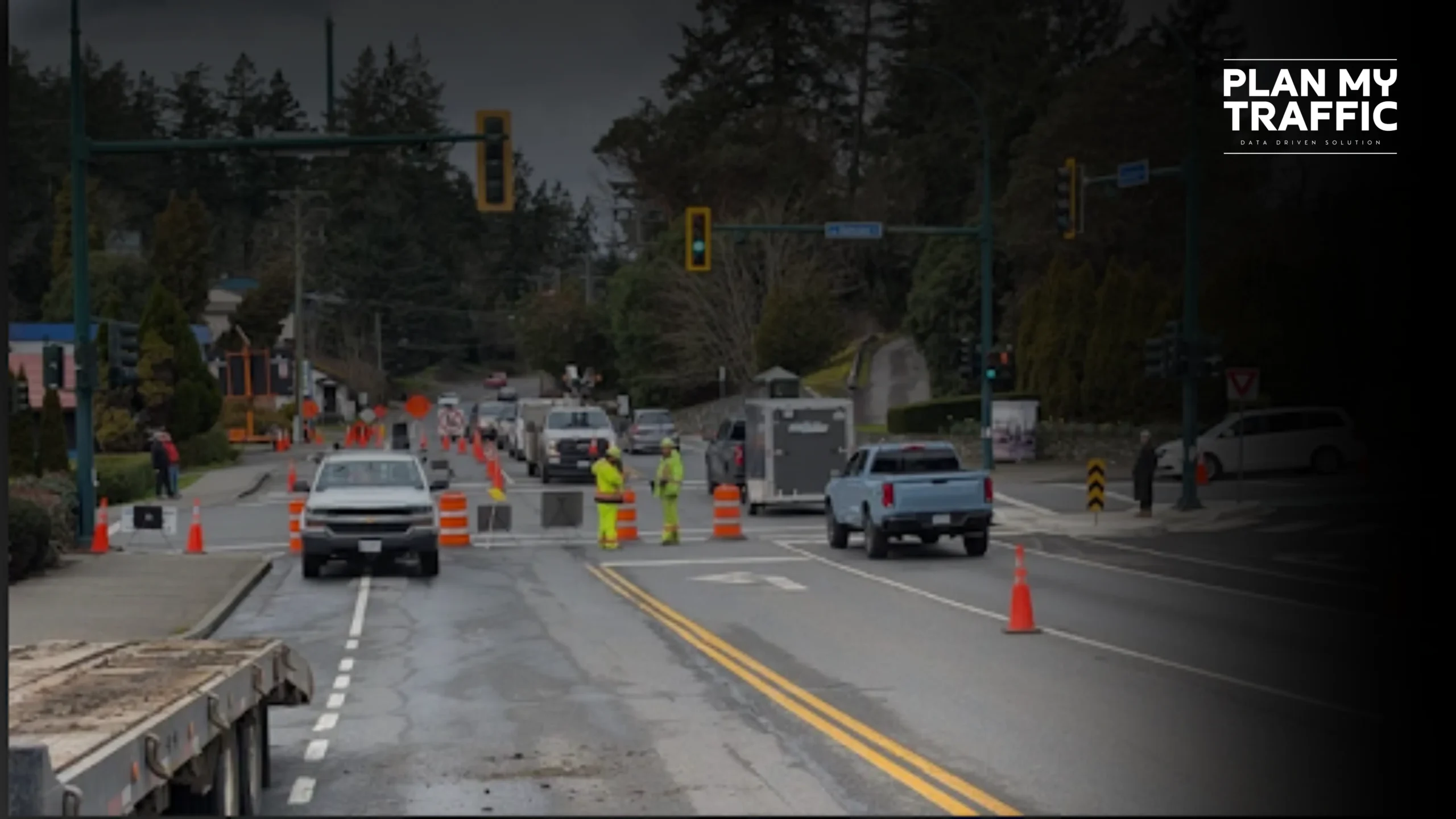 Traffic workers and cones managing a Traffic Management Plan Nanaimo work zone