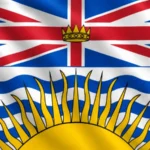 Flag of British Columbia: upper half features the Union Jack with a golden crown at center; lower half shows blue and white wavy horizontal stripes representing the Pacific Ocean, with a golden rising sun at the bottom.